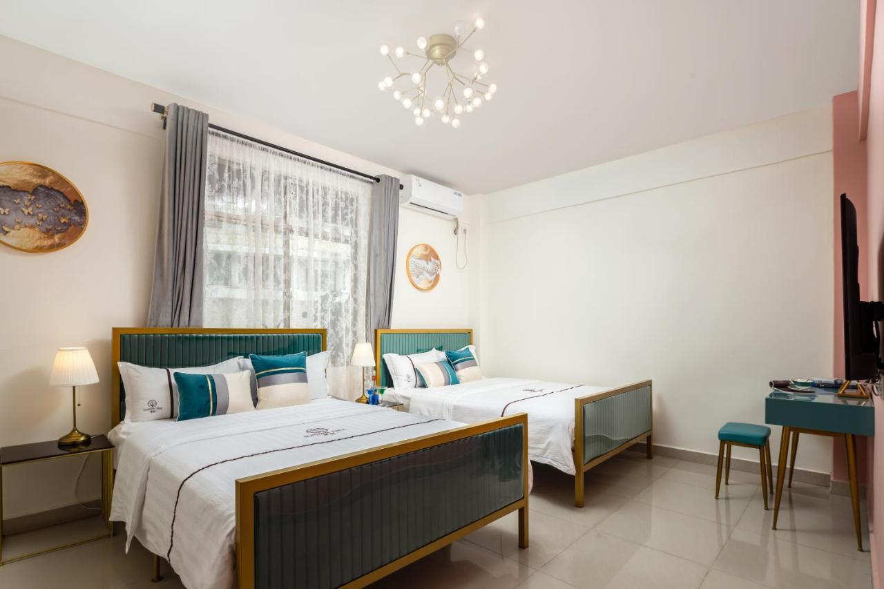 Summer Tree Inn Sanya Bagian luar foto