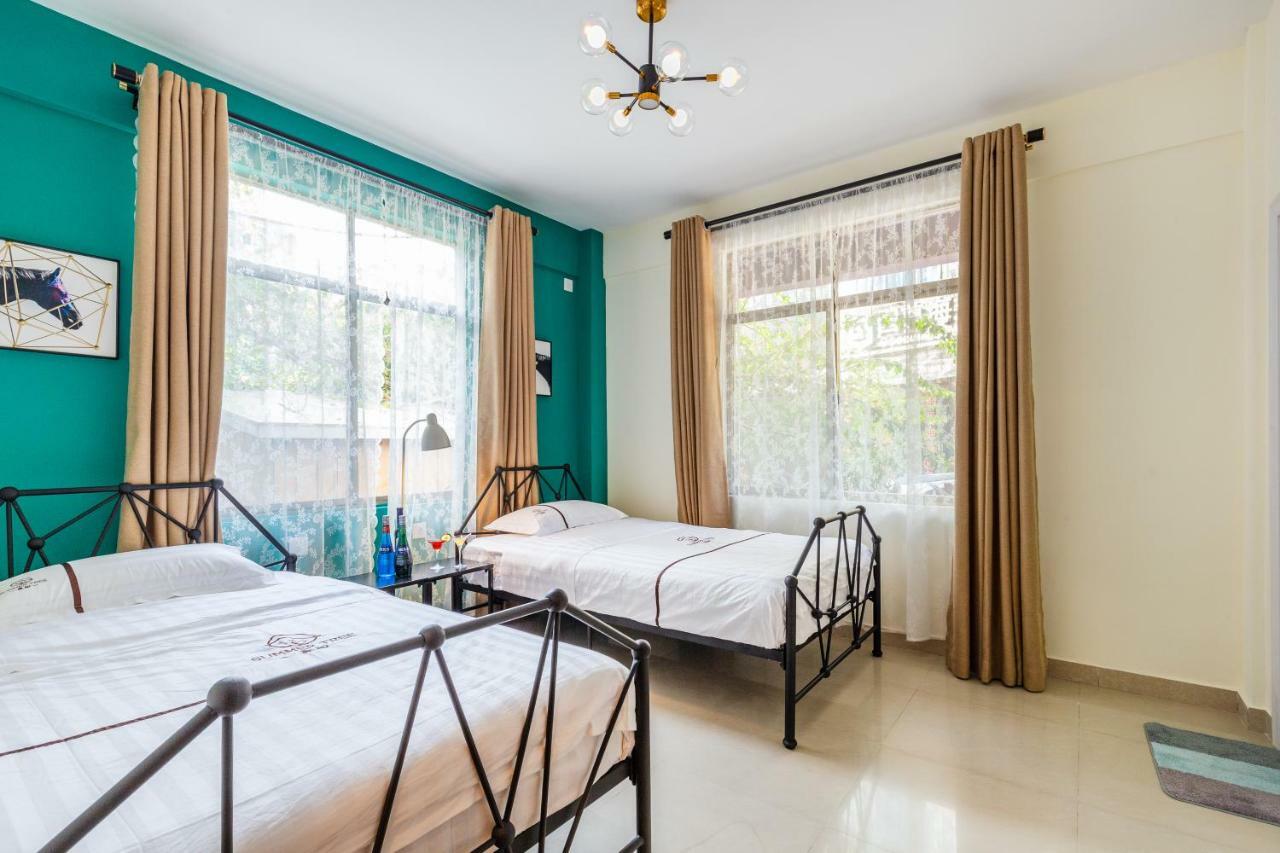 Summer Tree Inn Sanya Bagian luar foto